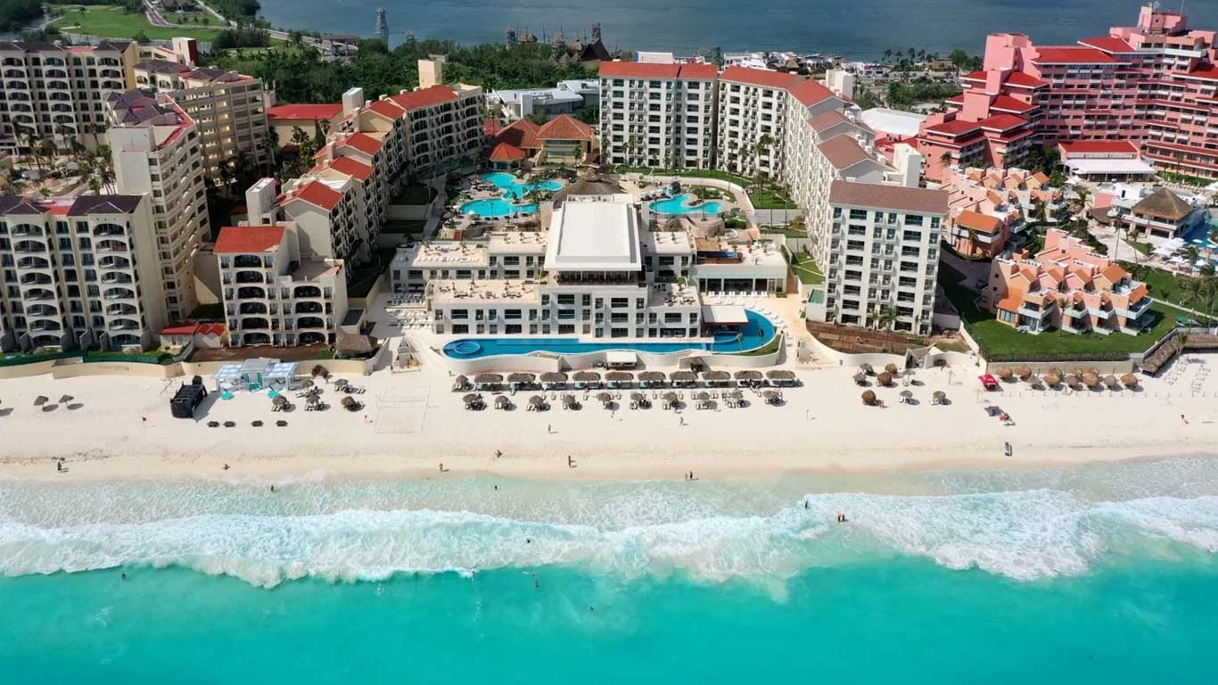 Emporio Cancun beachfront all-inclusive resort in Cancun Hotel Zone with ocean views, pools, and family-friendly amenities.