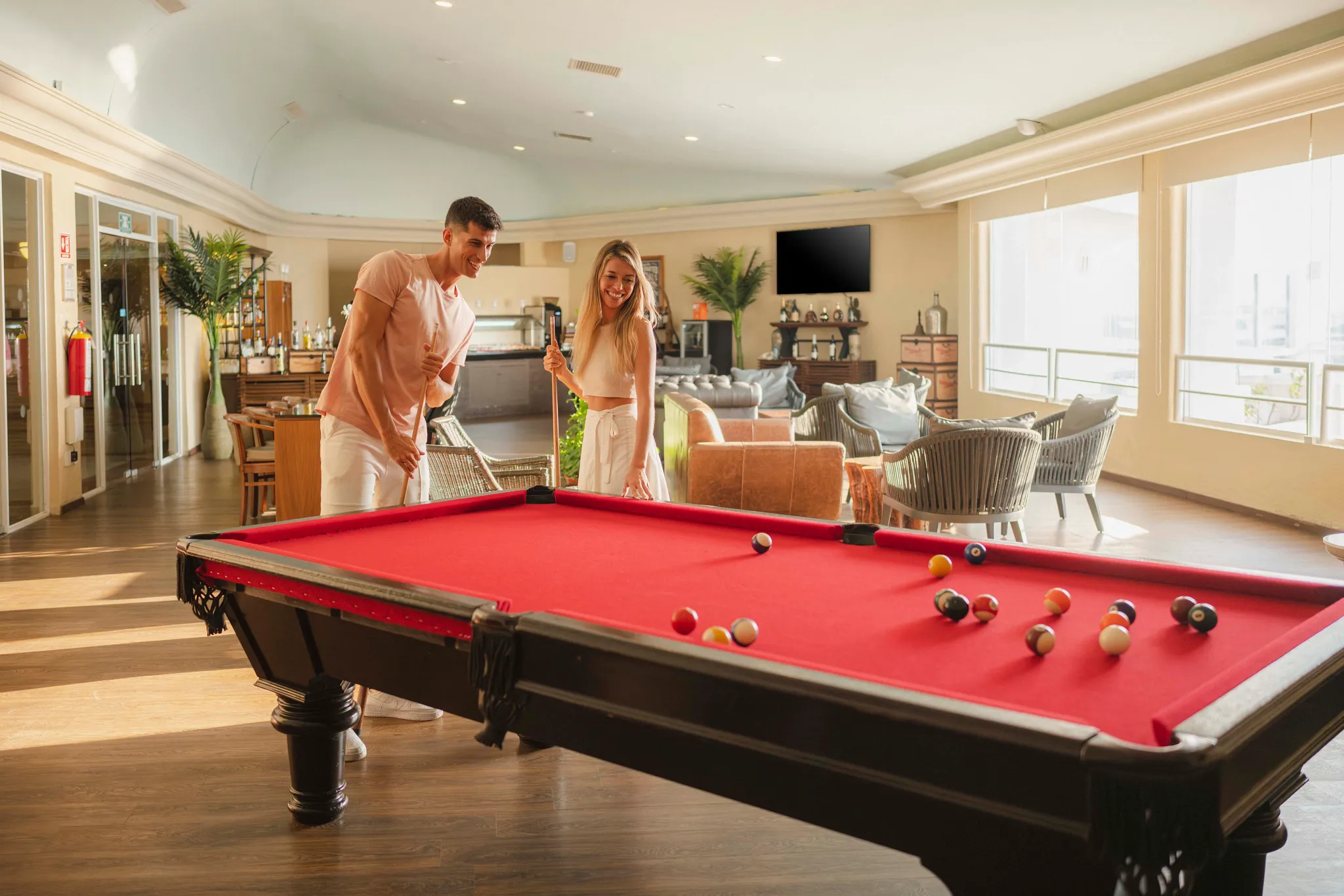 Sun Club Lounge at Sunscape Cancun Resort & Spa featuring elegant lounge seating, premium beverages, and an exclusive relaxing atmosphere.