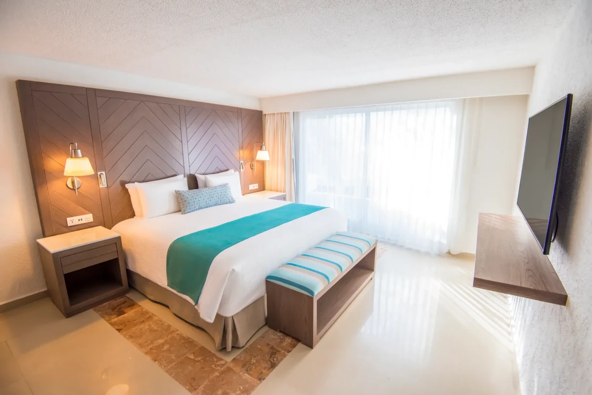 Junior Accessible King room with king bed and modern furnishings at Sunscape Cancun Resort & Spa.