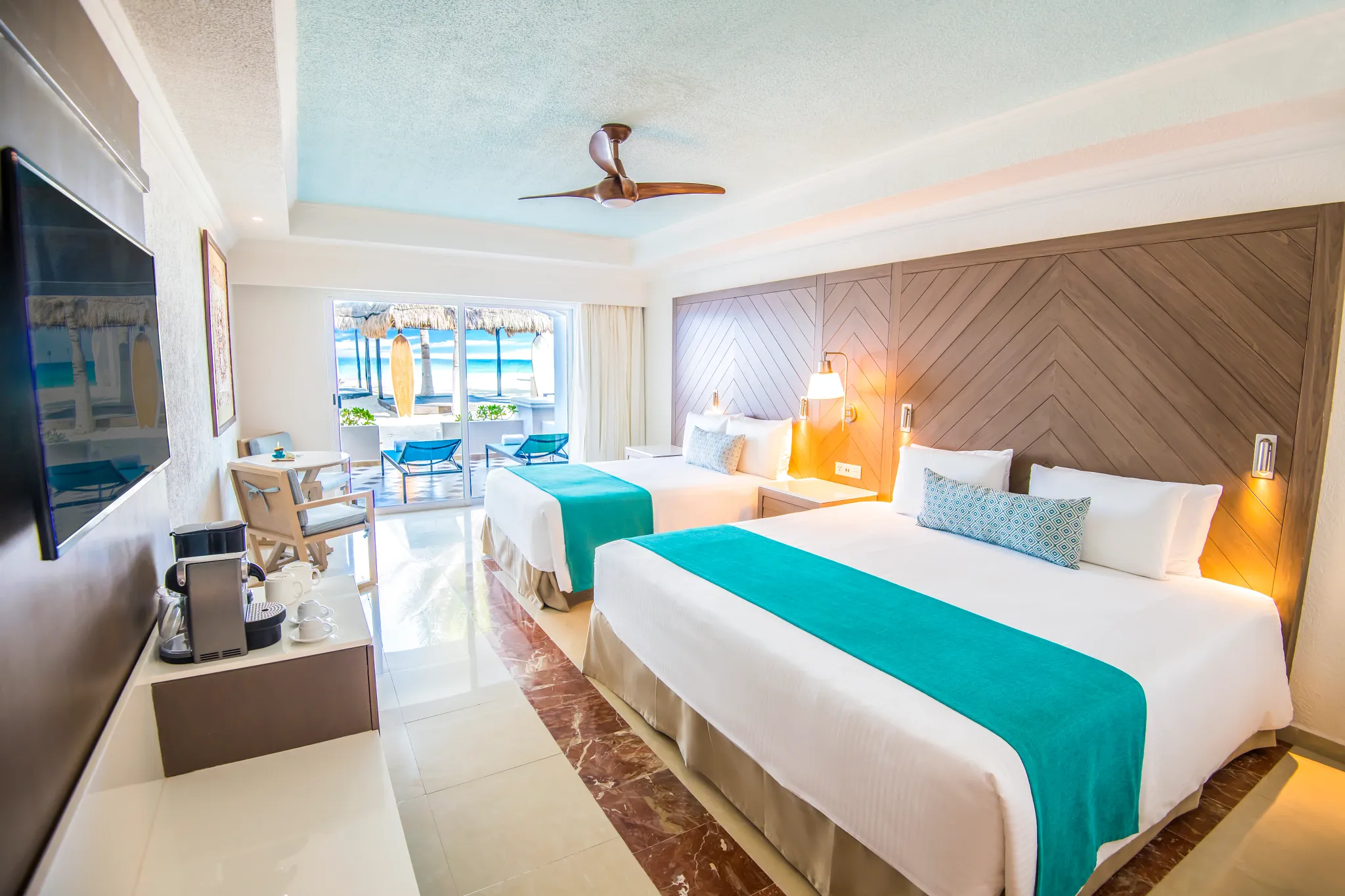 Junior Suite Beachfront with two double beds at Sunscape Cancun Resort & Spa.