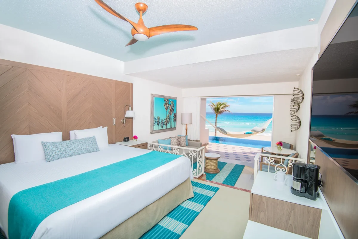 Junior Suite King Beachfront Swim-Up with ocean views and direct pool access at Sunscape Cancun Resort & Spa.