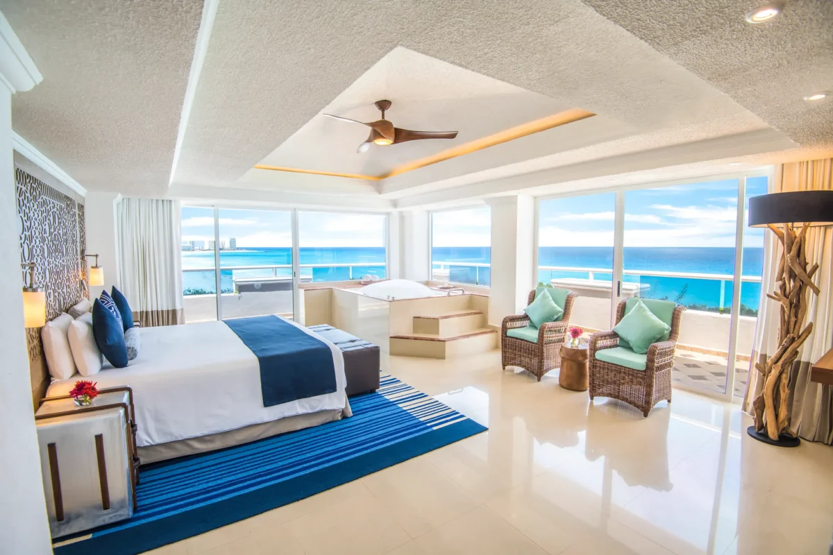 Presidential Suite bedroom with ocean views at Sunscape Cancun Resort & Spa.
